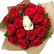 Bouquet of red roses with 1 white