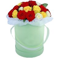 Multicolored roses in a hat box
