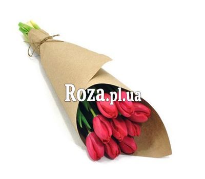 A small bouquet of tulips in craft A small bouquet of tulips in craft